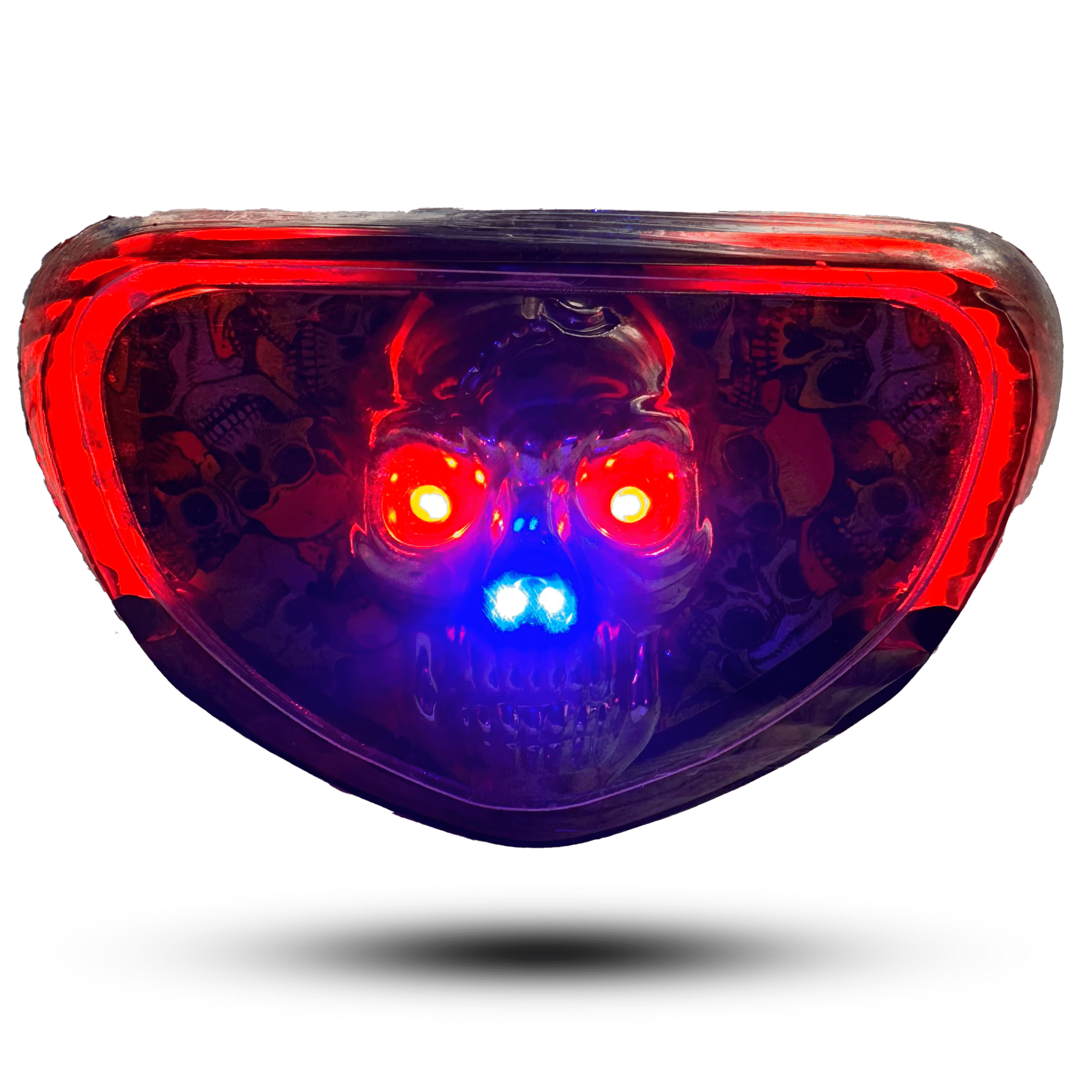 Red and blue skull back light cd70. Motorcycle taillight featuring a skull design with glowing red eyes and blue accents.
