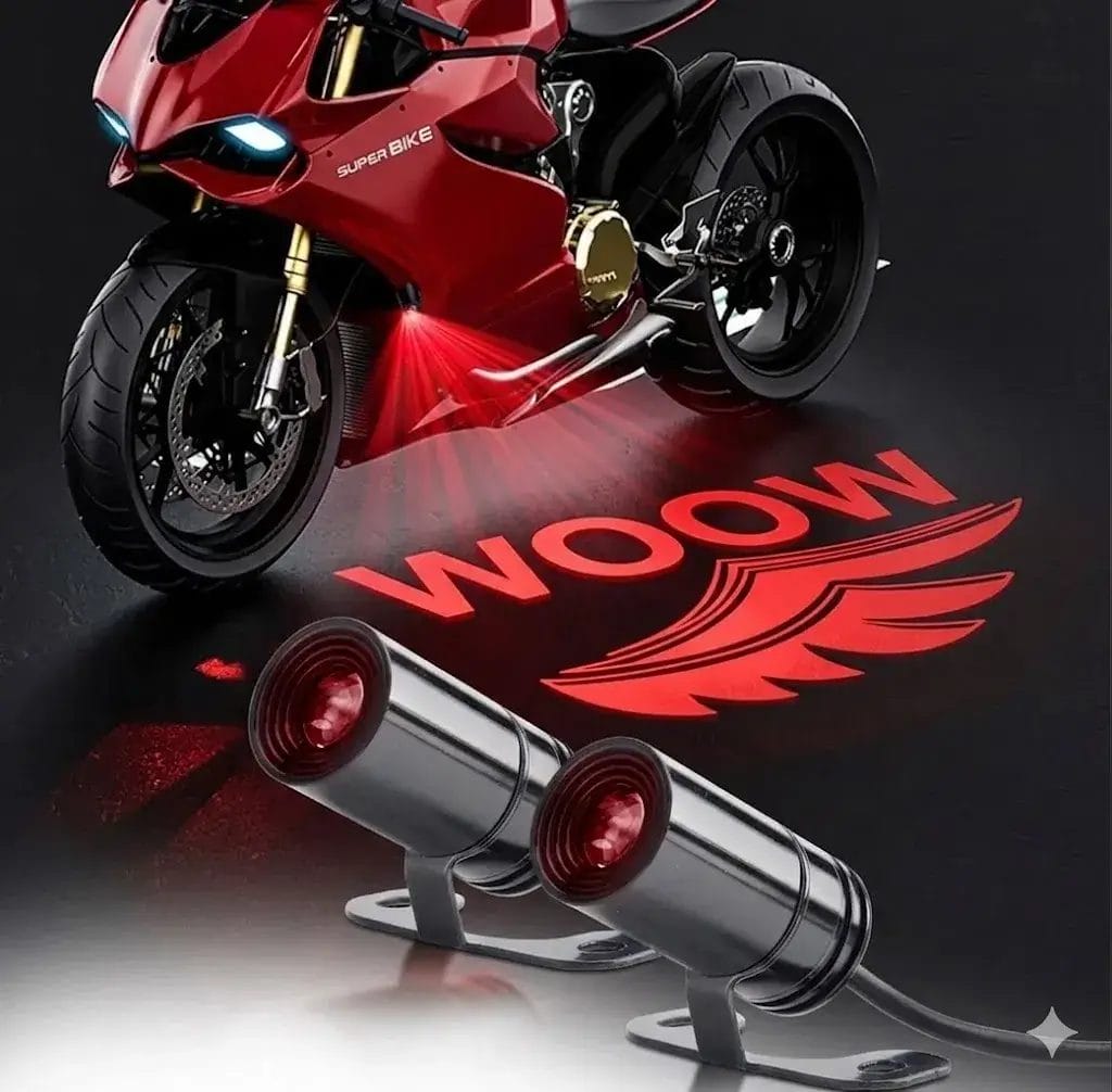 High-intensity red LED ghost shadow projector light mounted on a red sport motorcycle, projecting a red wing logo and "WOOW" text onto the asphalt.