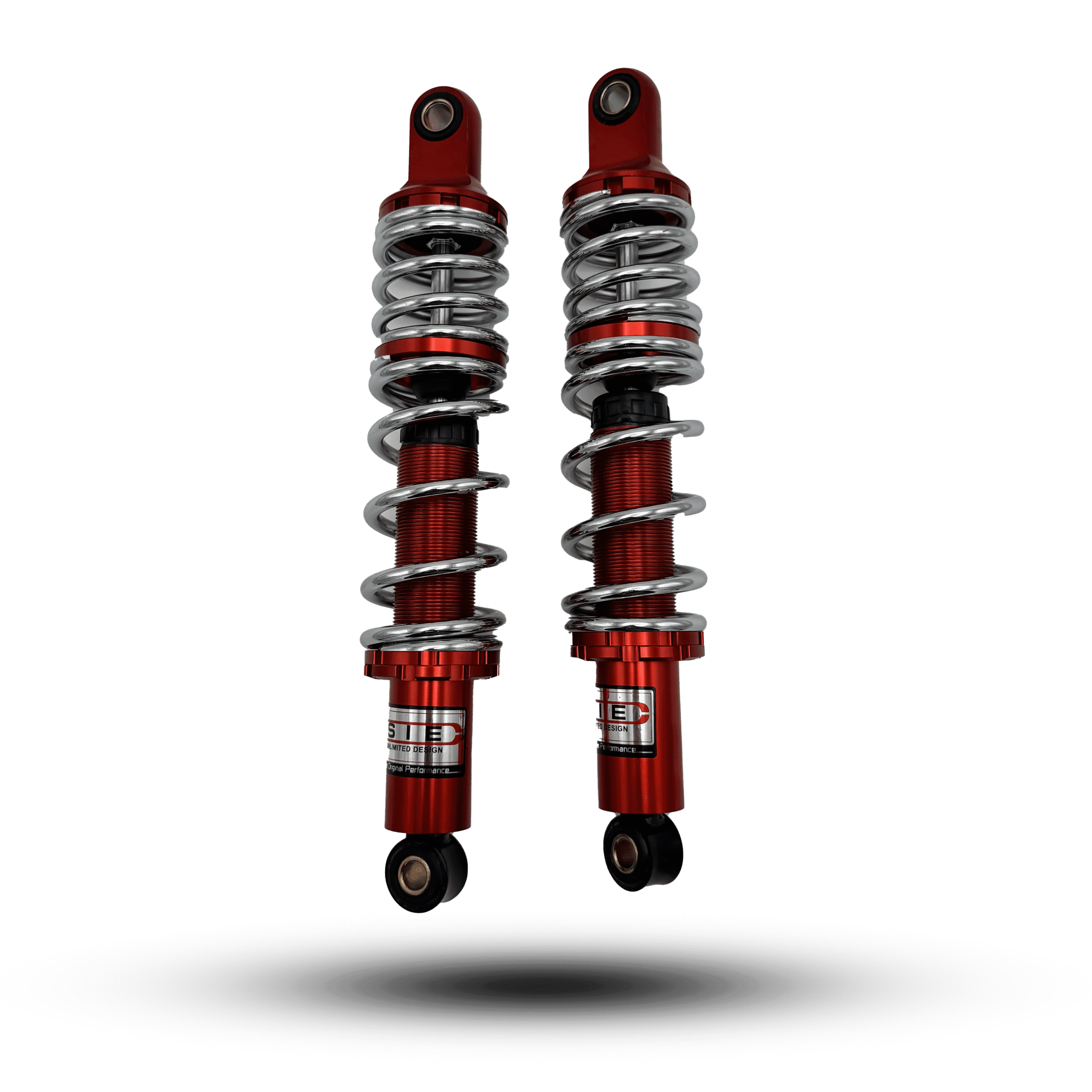 Red shock sie with chrome springs, motorcycle suspension components for improved ride and handling.