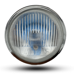 Round head light with a shiny chrome bezel and vertically ribbed clear lens, reflecting a blue sky