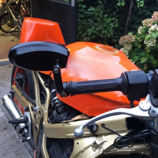 close up of a motorcycle barend mirror