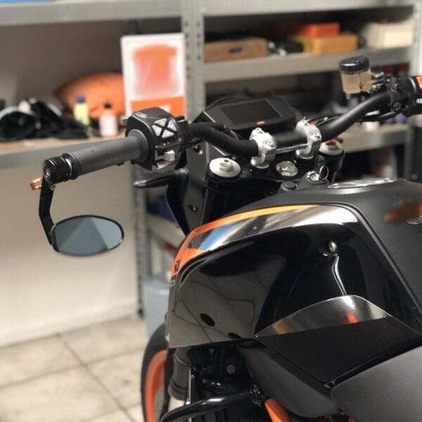 motorcycle with a mirror on the handlebars