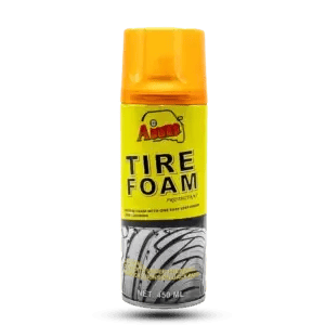 Aim Tire Foam Protectant 450ml spray can with a bright yellow label and orange cap, showing a high-detail tire tread, used for deep cleaning and shining tires.