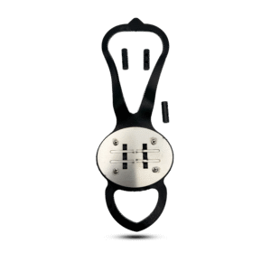 Black shoe scratcher with silver foot plate, set against a reflective black backdrop.