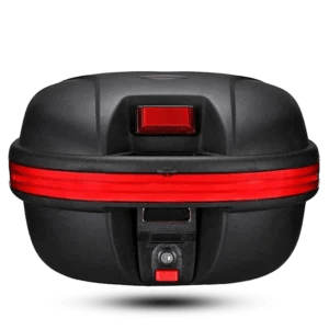 Open view showing a full-face helmet inside a black and red 29L motorcycle top box, highlighting its spacious interior and secure locking system.